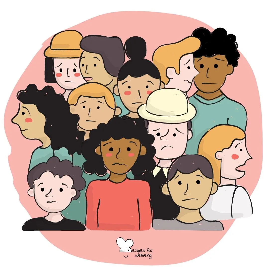 A crowd of many different faces pressed close together
