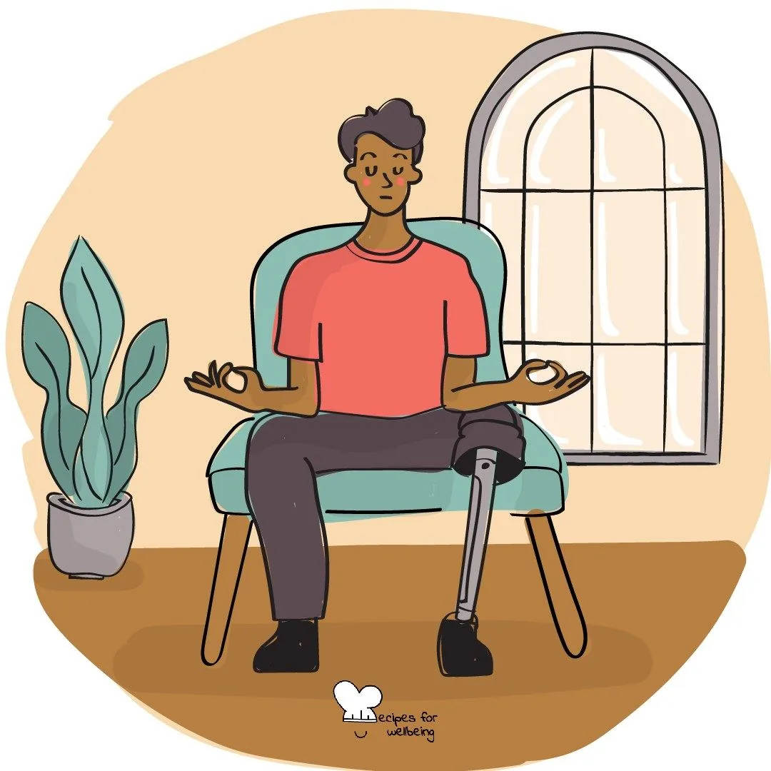 A person sitting by a window with one hand resting over their heart